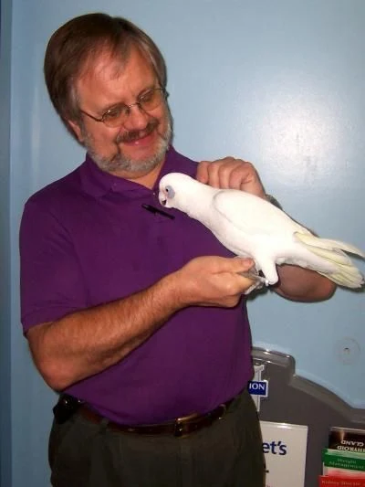 Dr. Gormley with a white bird