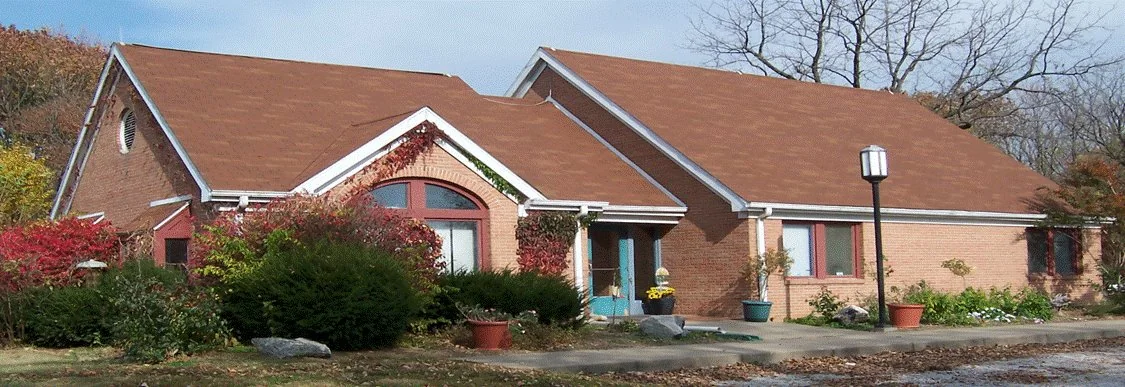 Highland Veterinary Clinic’s brick building and front entrance on Darmstadt Road.