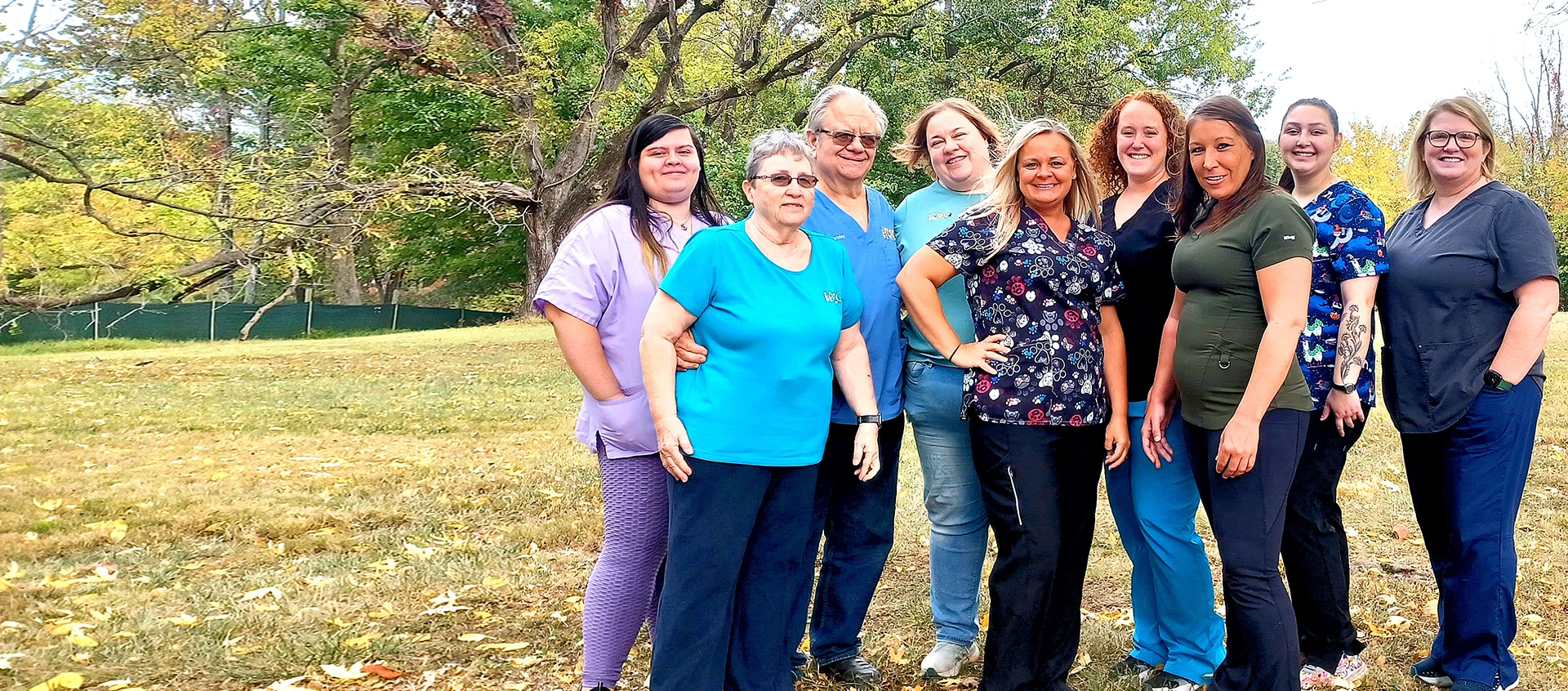 The Highland veterinary team photographed together outdoors at the clinic.